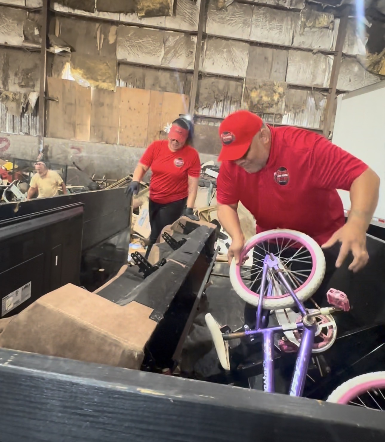Gracie’s crew loading household items into the trailer